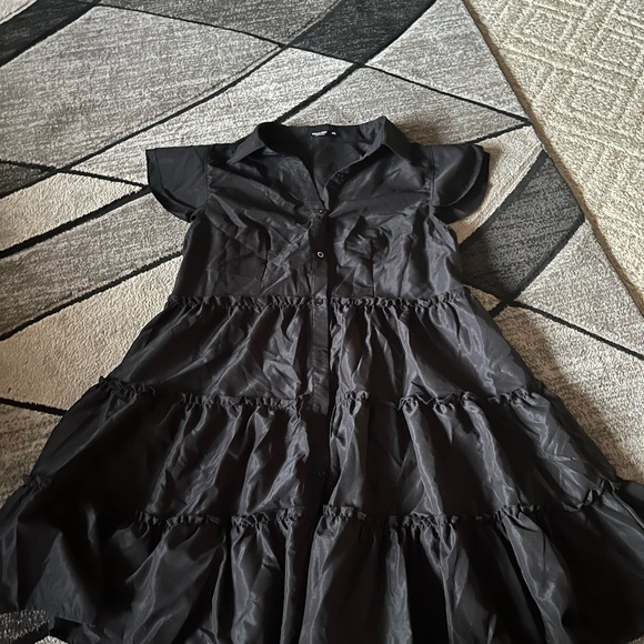 Black dress, never worn! Has buttons going down the front, and ruffles! - Picture 2 of 2